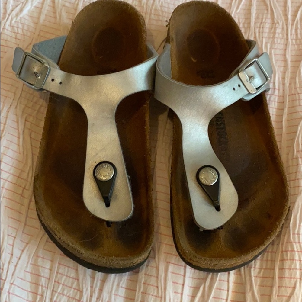 Birkenstock’s size 33. Silver